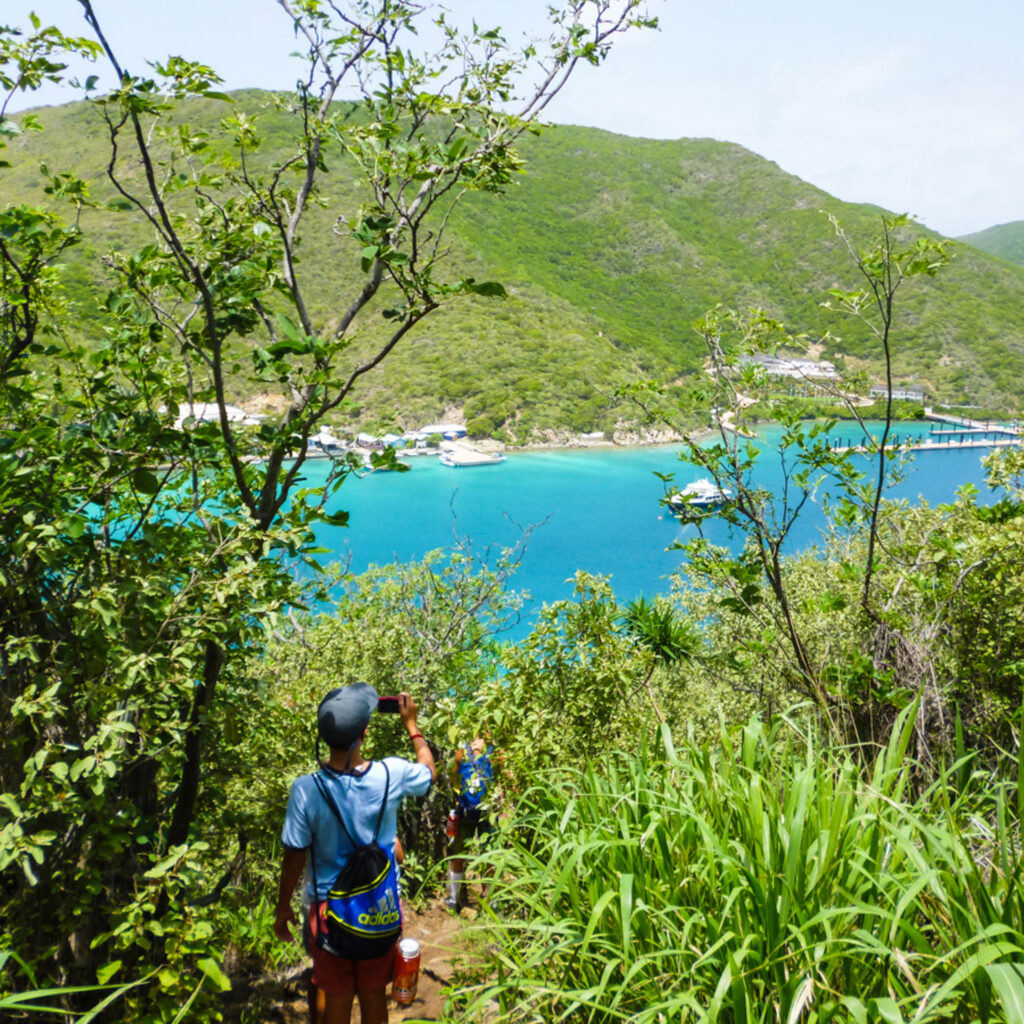 A group of people hiking along a trail.