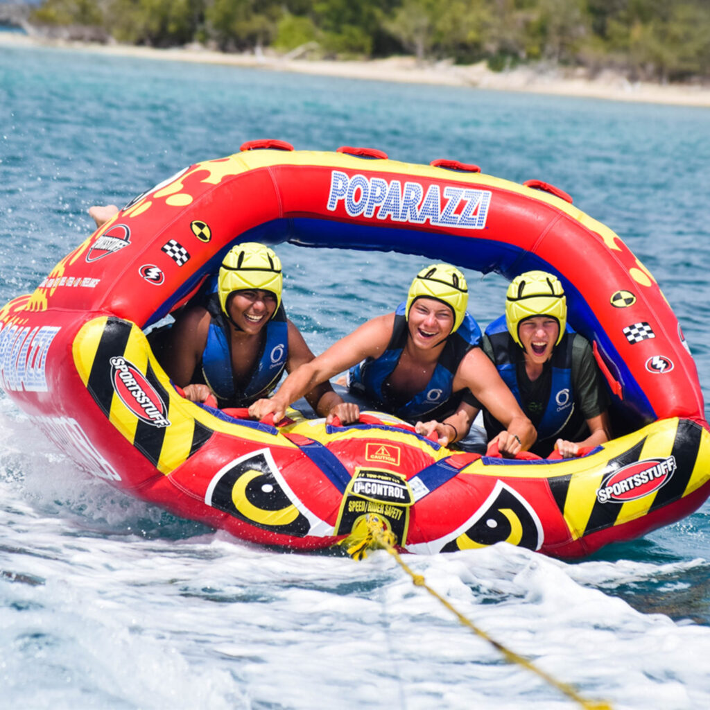 A group of people on a water raft.