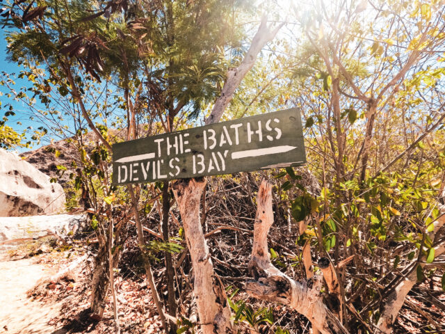 A sign for The Baths and Devis Bay.