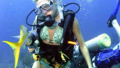 A woman wearing scuba gear.