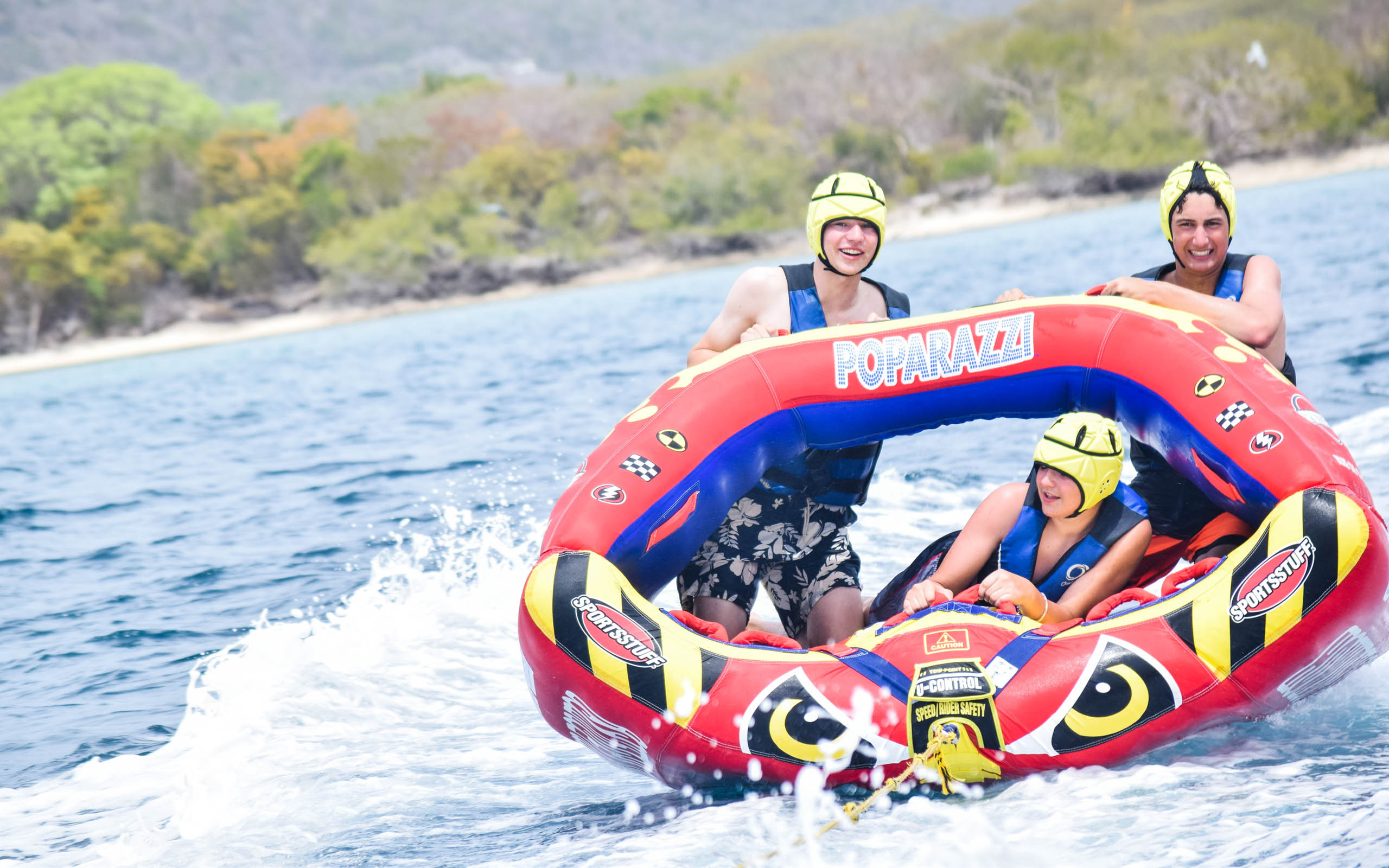 A group of people on a raft.