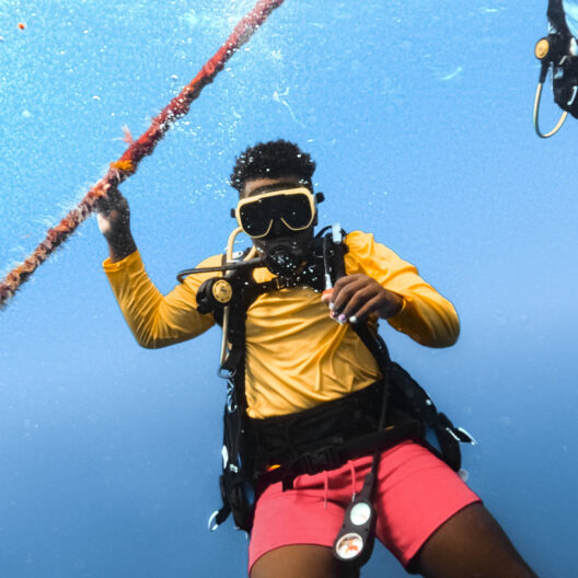 Camper scuba diving.