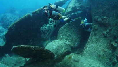 Scuba divers underwater in the ocean.