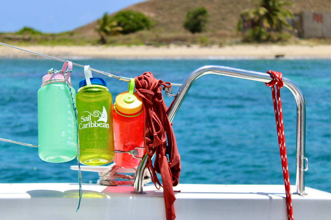 Colorful water bottles on a boat.